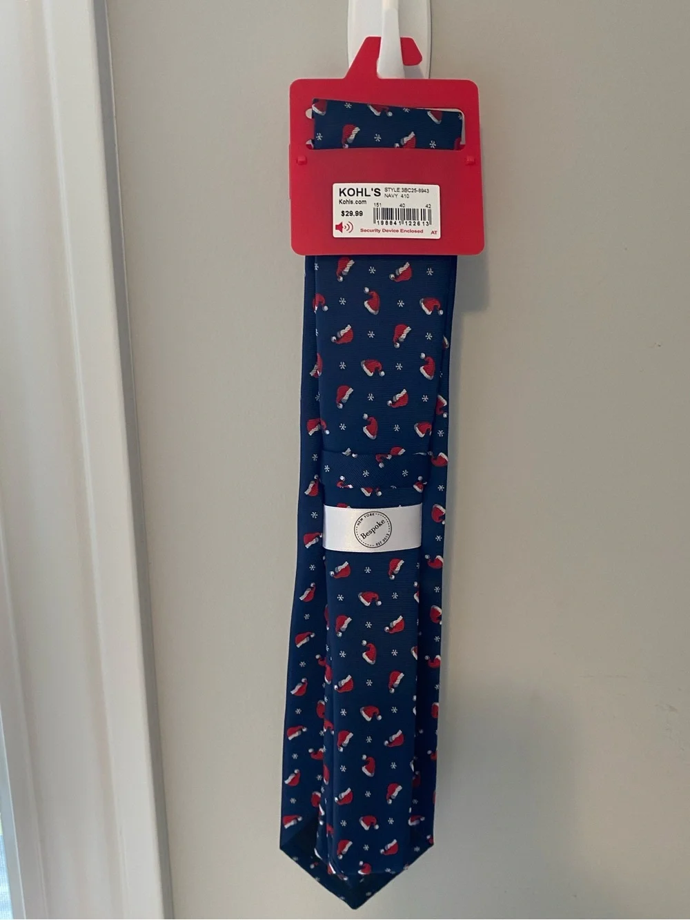 Bespoke Navy Blue Holiday Tie with Red Santa Hat Pattern